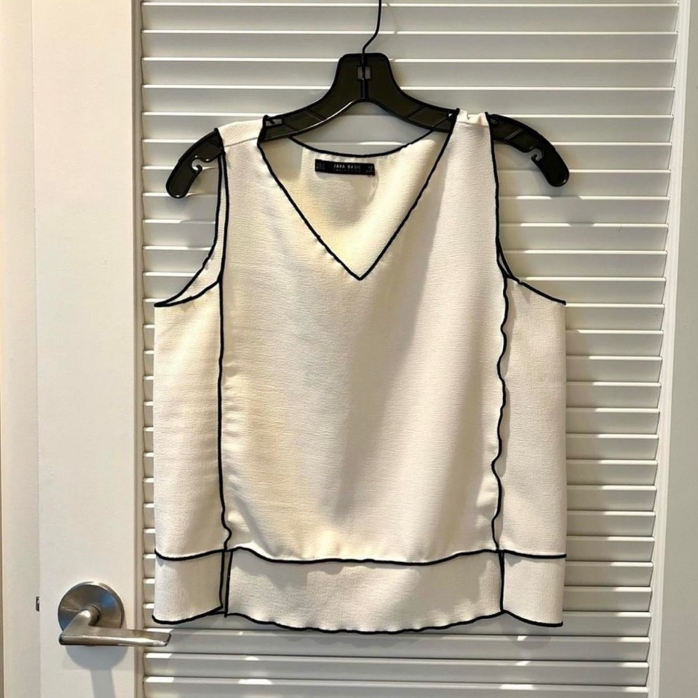 White Sleeveless Top with Black Trim